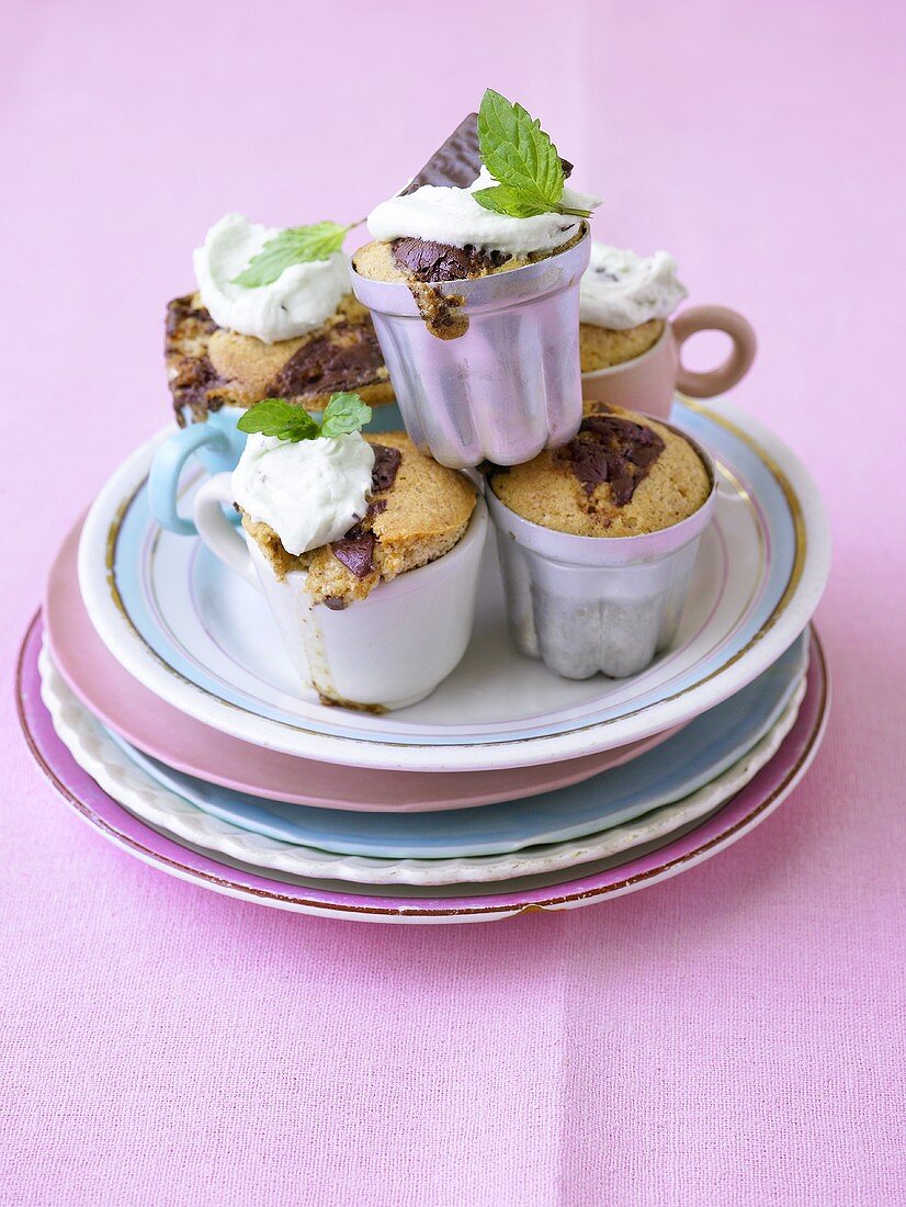 Mini chocolate cakes in cups and ramekins