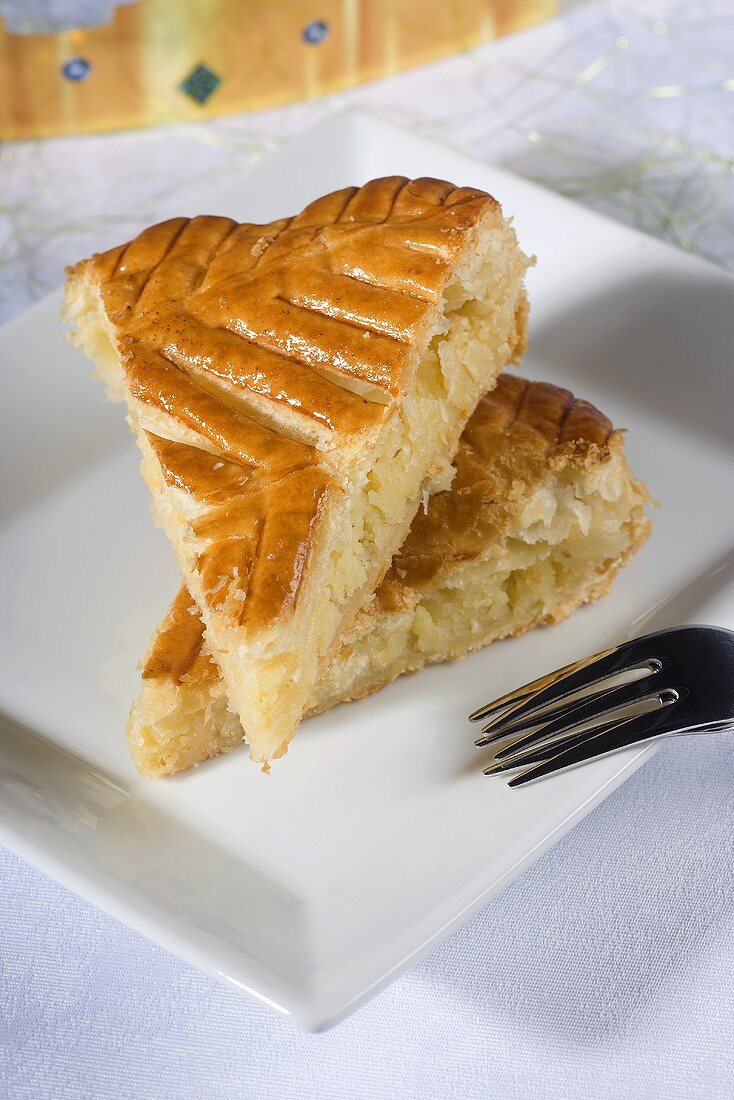 Two slices of galette des rois frangipane