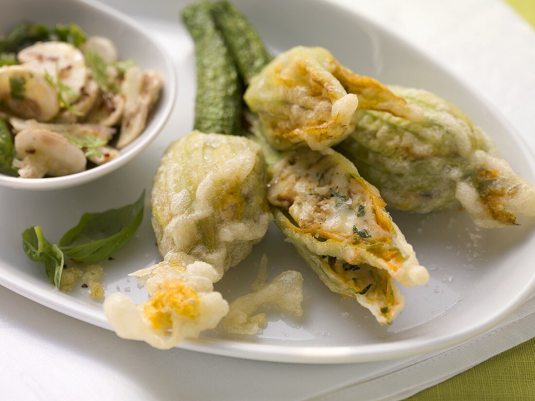 Stuffed courgette flowers with a mushroom salad