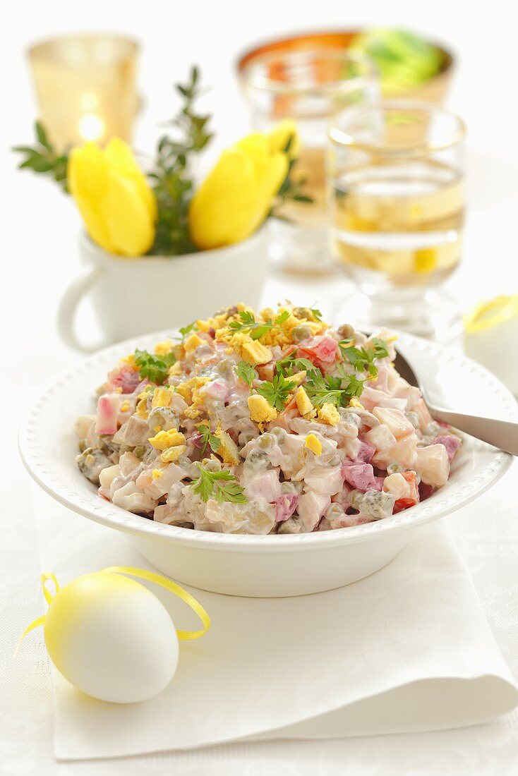 Vegetable salad with beetroot, gherkins, eggs and mayonnaise