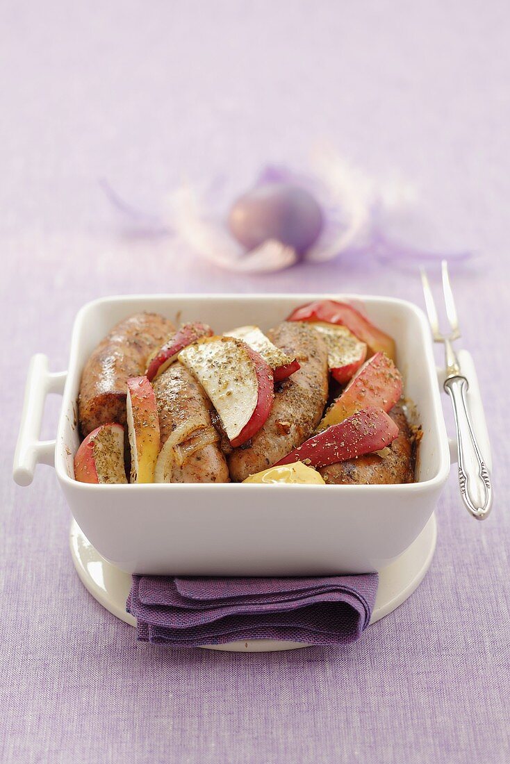 Sausages with apple slices, onions and marjoram