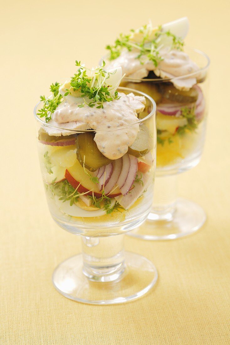 Egg, gherkin and onion salad with yoghurt dressing