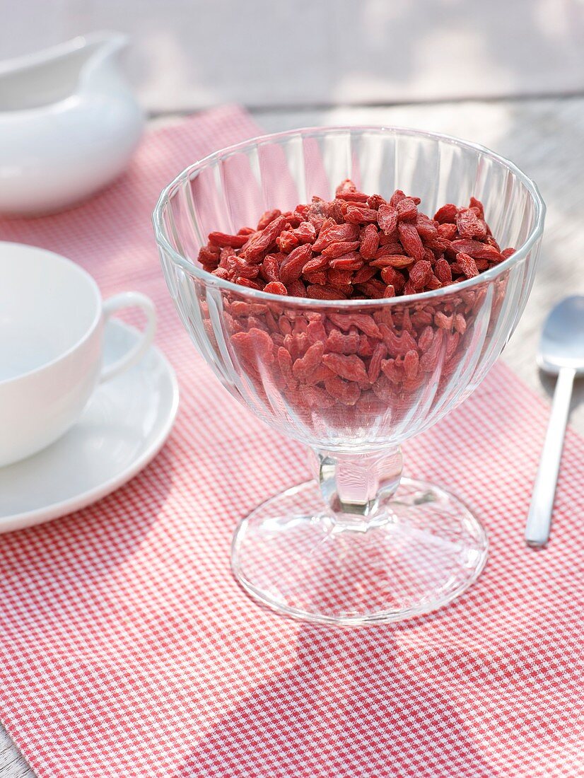 Goji berries in glass pedestal dish