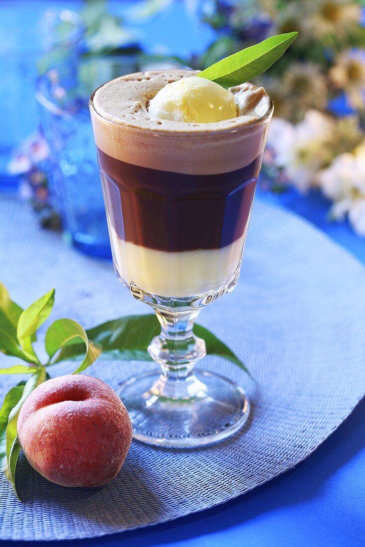 Eiskaffee (iced coffee drink) with peach liqueur