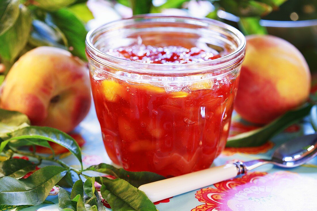 Peach jelly in jam jar