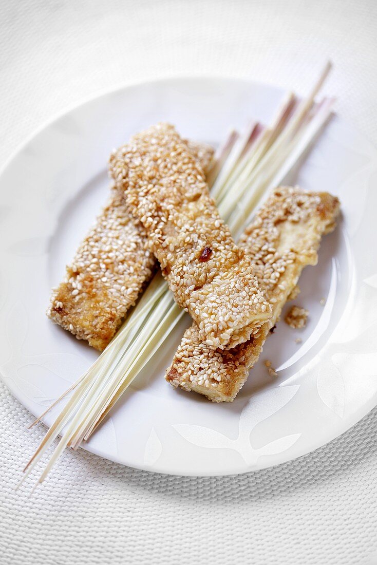 Fried tofu slices with sesame crust