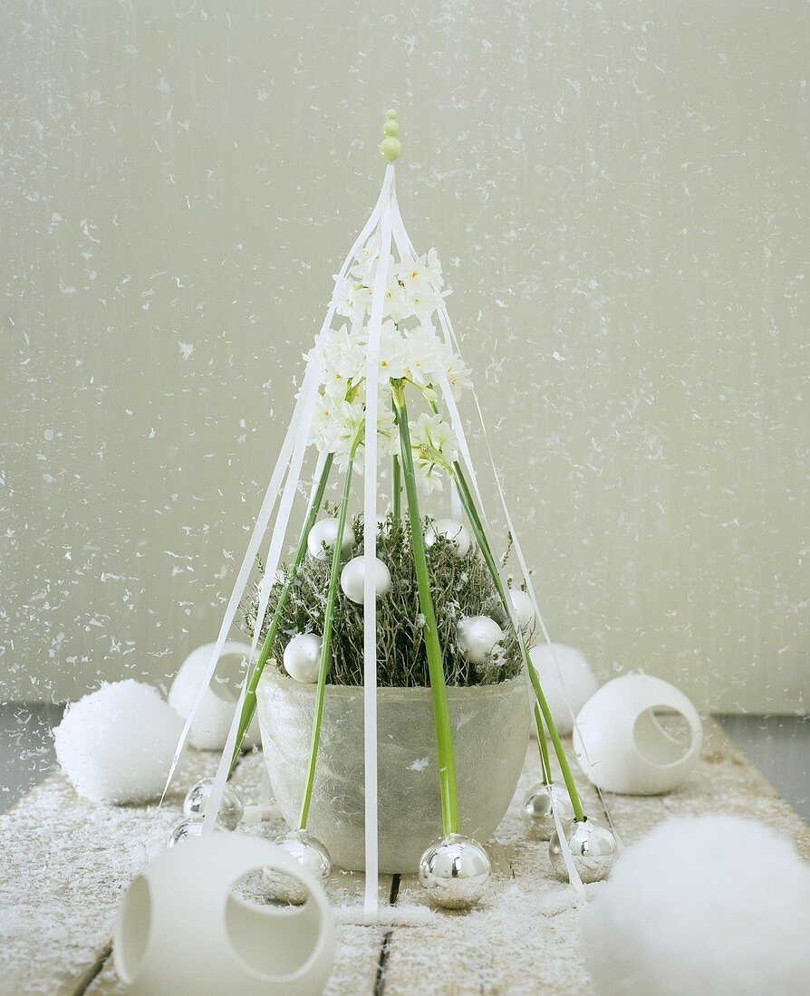 Winter flower arrangement with baubles