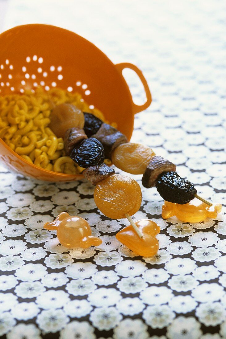 Duck breast and dried fruit skewers