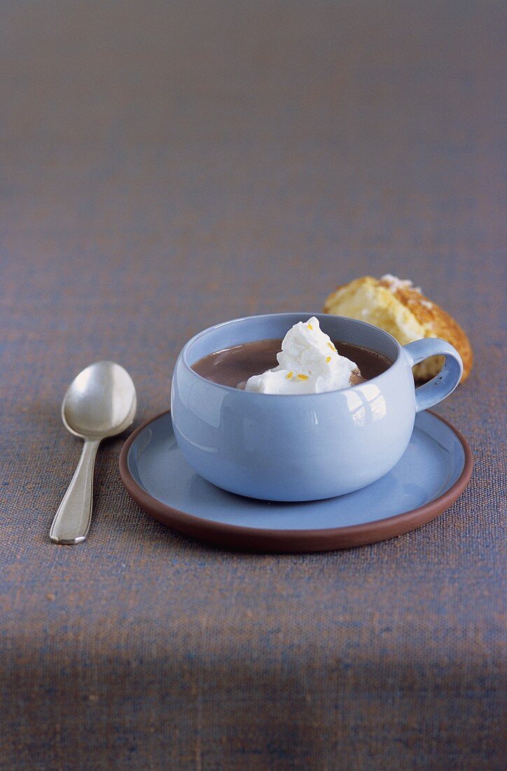 Hot chocolate with cinnamon and orange whipped cream