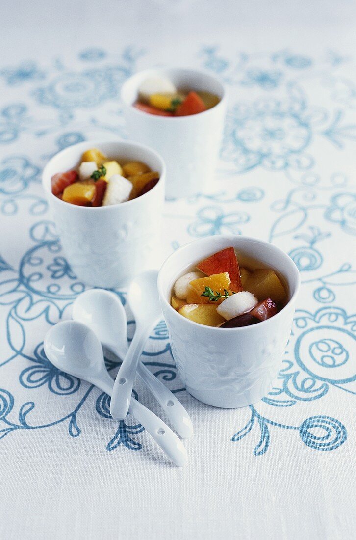Summer fruit soup in porcelain beakers