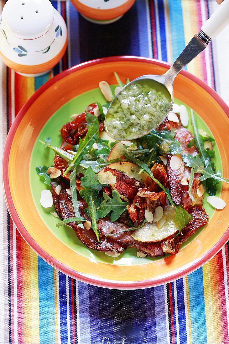 Rocket and peach salad with pesto