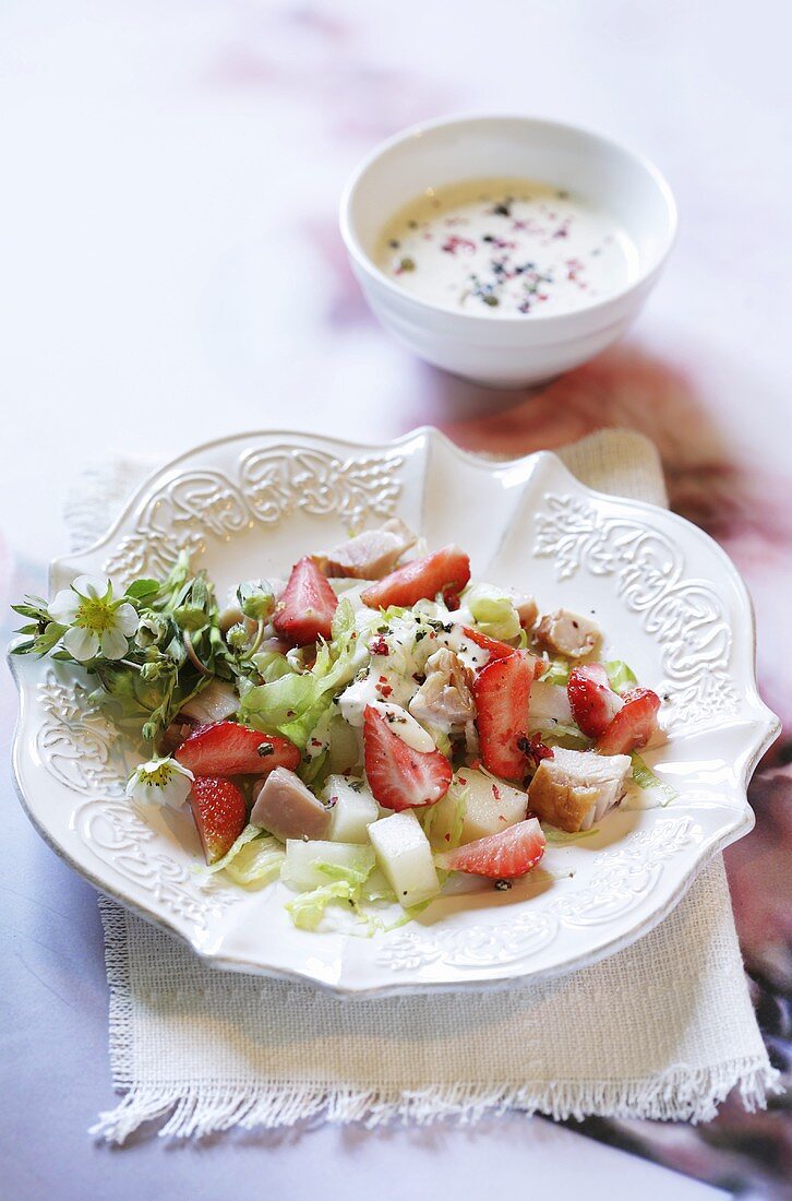 Strawberry salad with pepper sauce