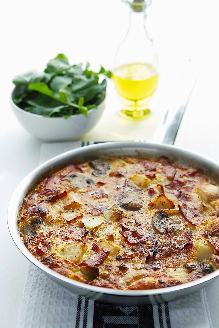 Spanish omelette in a frying pan