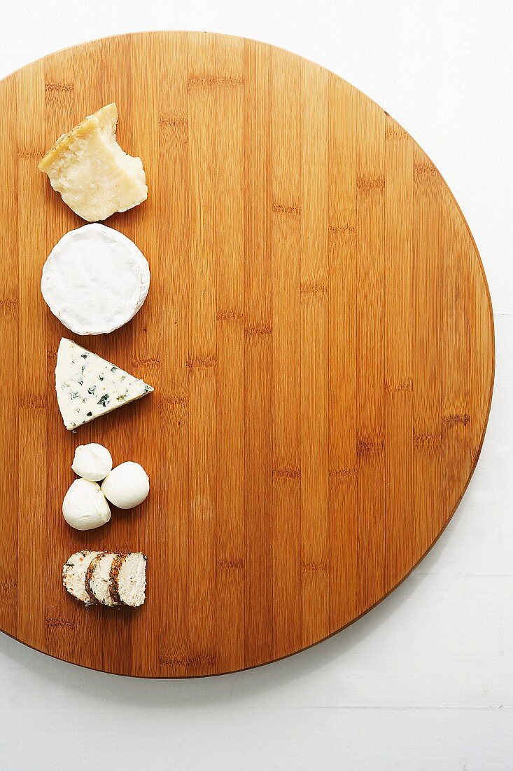 Various Cheese on Wooden Breadboards