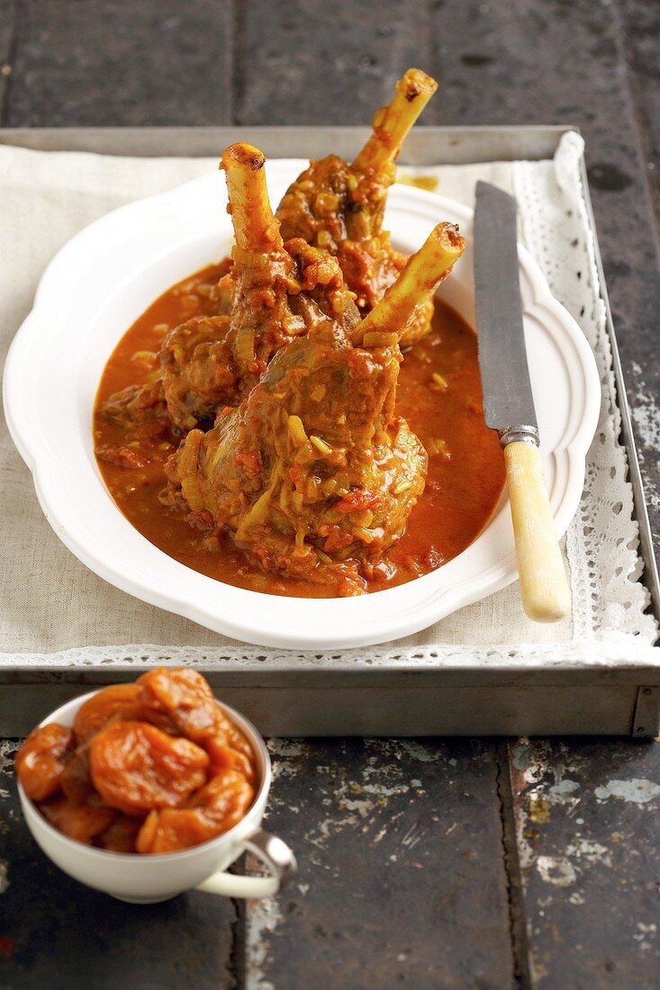 Braised lamb shanks in curry sauce