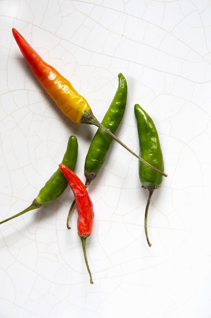 Chillies on white background