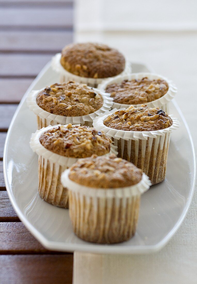Nut muffins on plate
