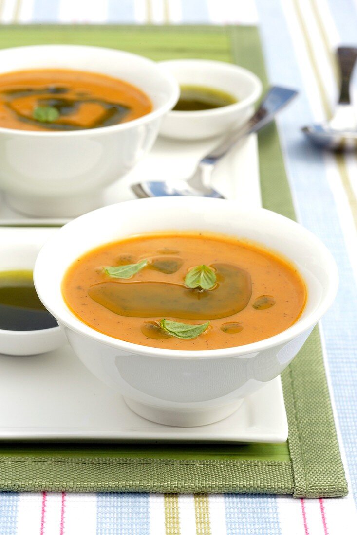 Cream of pumpkin soup with herb oil