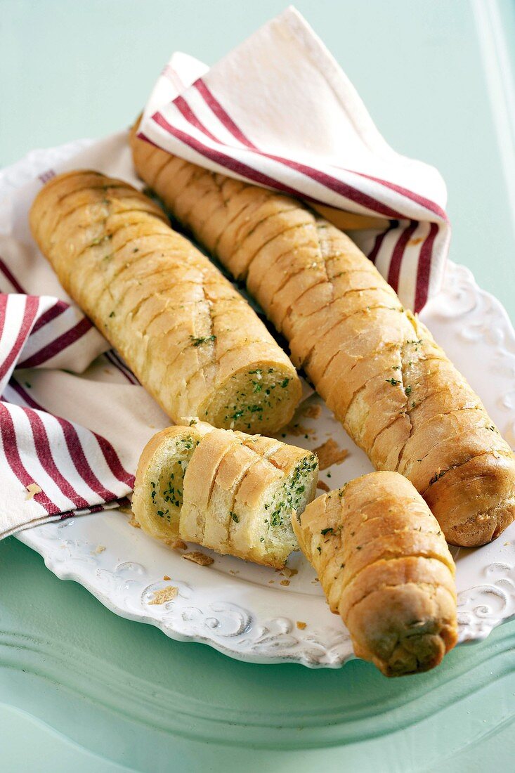 Baked baguettes with herb butter