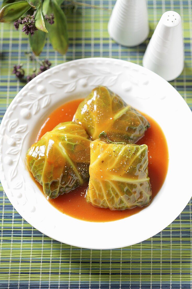 Stuffed savoy cabbage leaves with tomato sauce