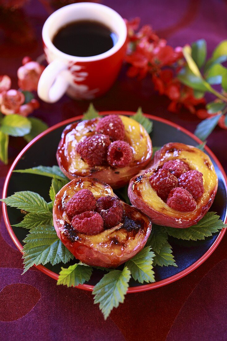 Baked peaches with raspberries