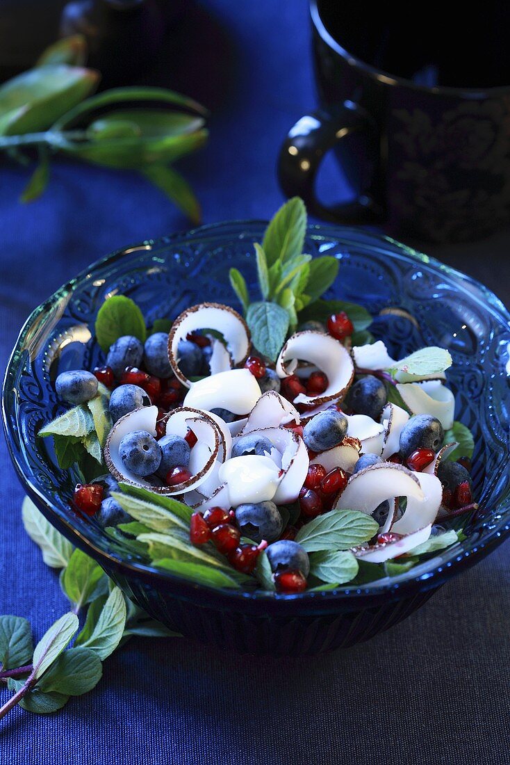Blueberry and coconut salad with pomegranate seeds