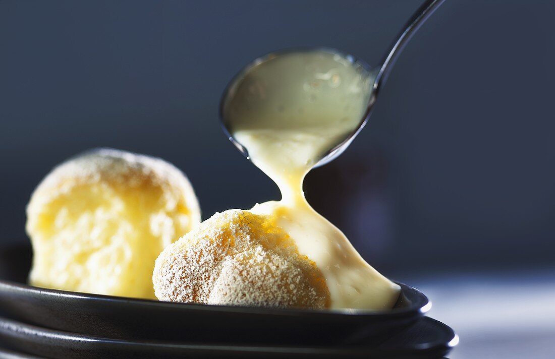 Buchteln (sweet yeasted dumplings) with custard