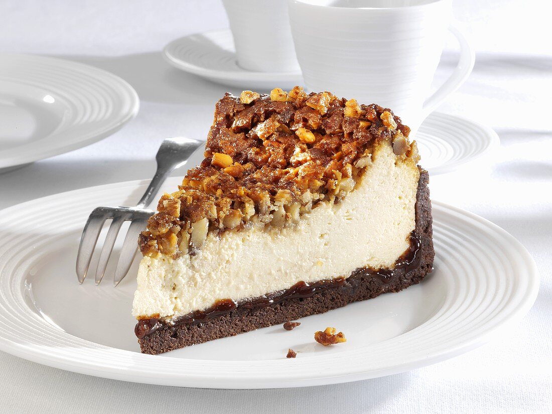 Piece of cheesecake with nuts