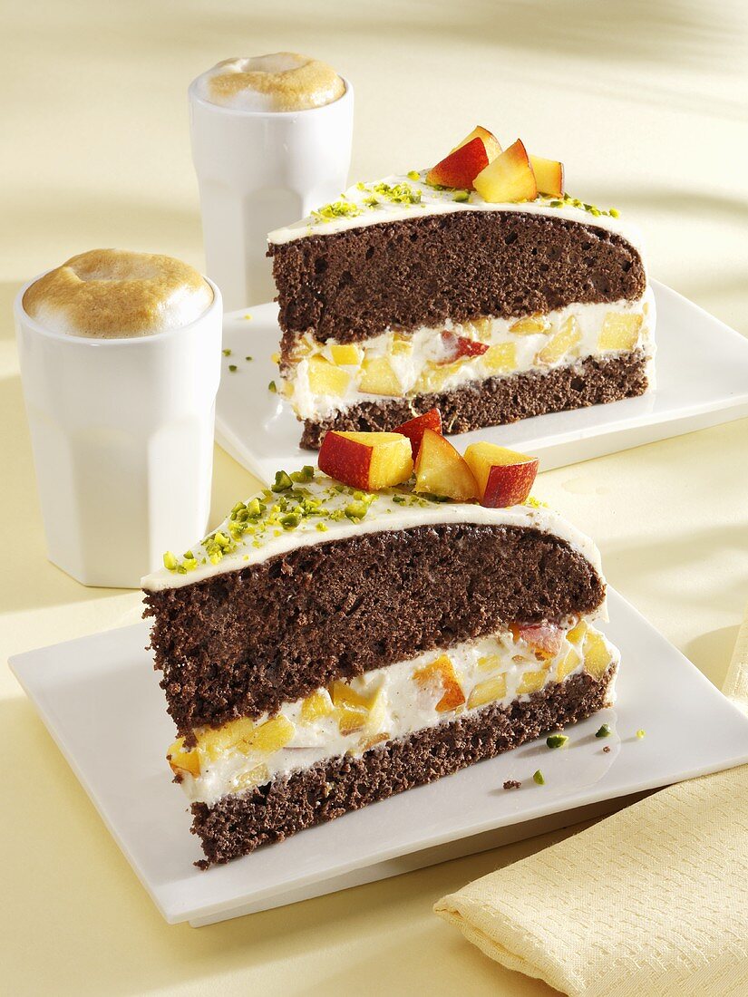 Cake with cream cheese and nectarine filling, cappuccino