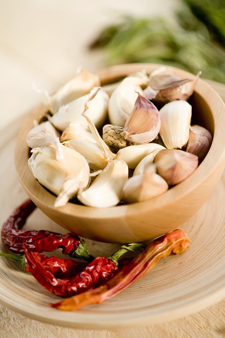 Garlic in small bowl and dried chillies