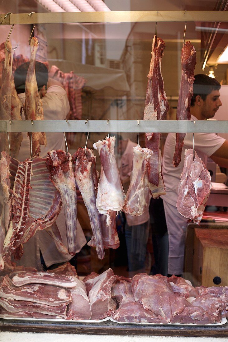 View through window into butcher's shop