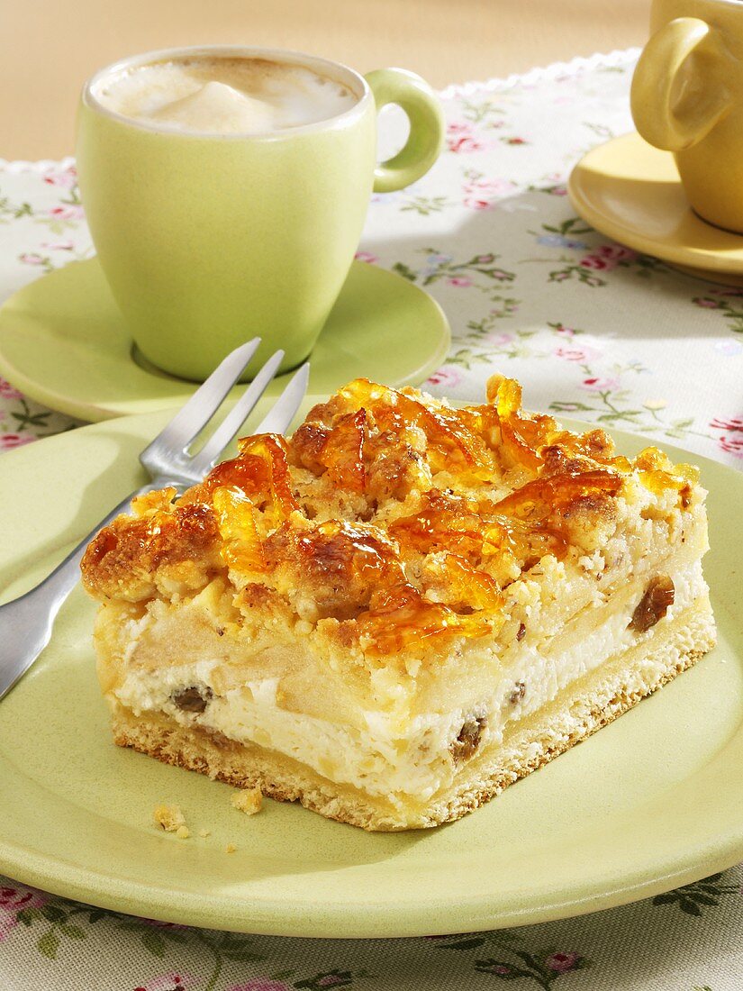 Piece of apple cake with vanilla crumble