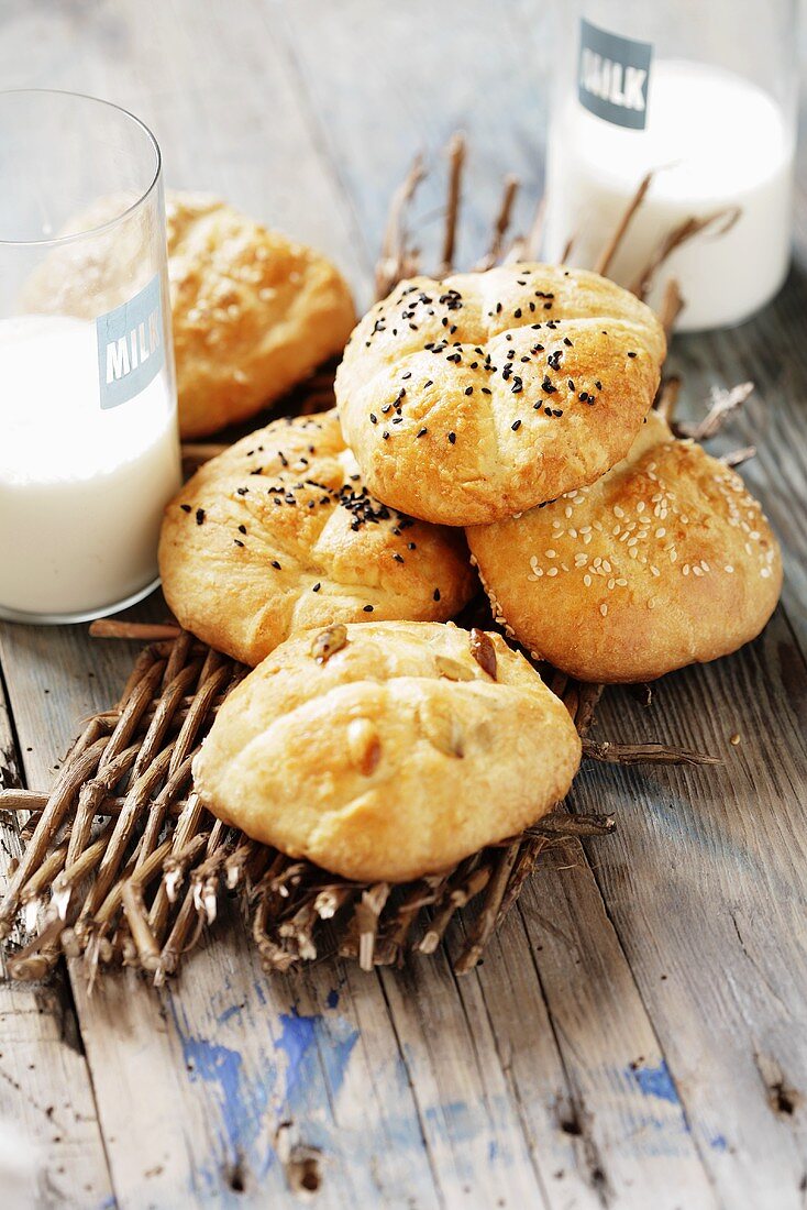 Bread rolls and glass of milk