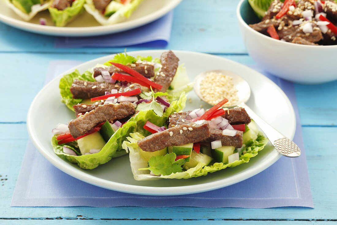 Beef, cucumber and coriander in romaine lettuce boats