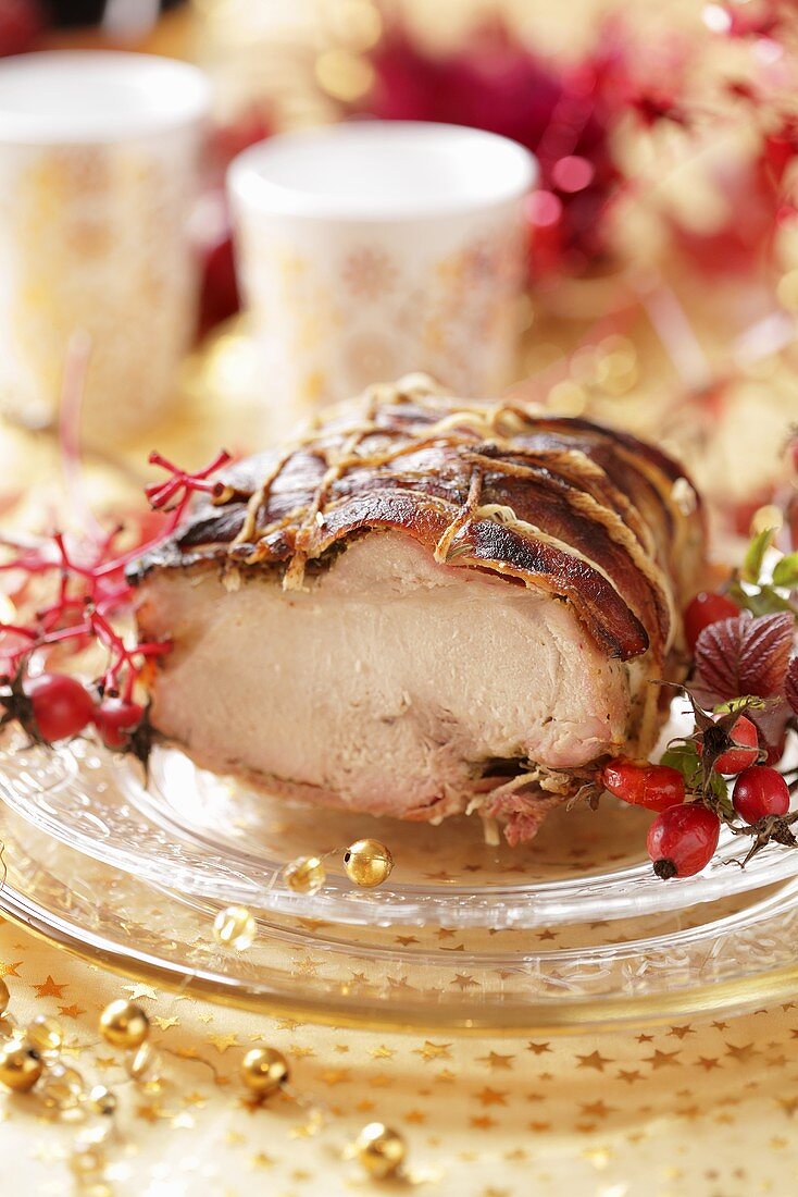 Bacon-wrapped roast pork for Christmas