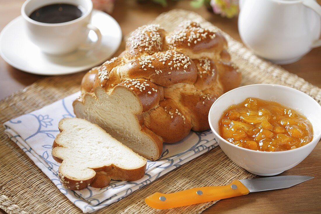 Bread plait and apricot jam