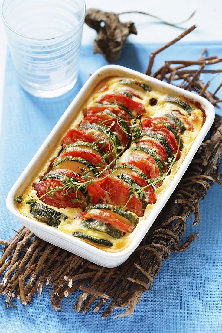 Courgette and tomato bake in baking dish