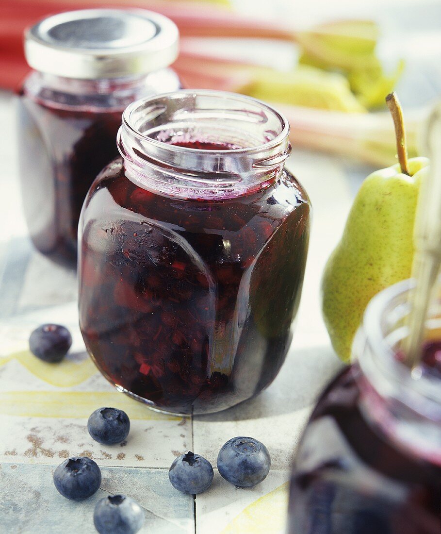 Blueberry and pear jam in jam jars