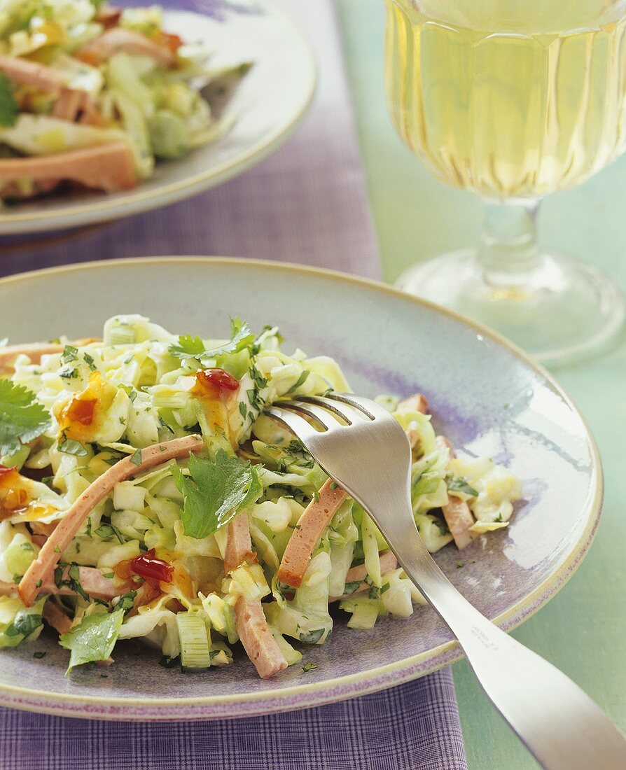 Cabbage salad with strips of Leberkaese