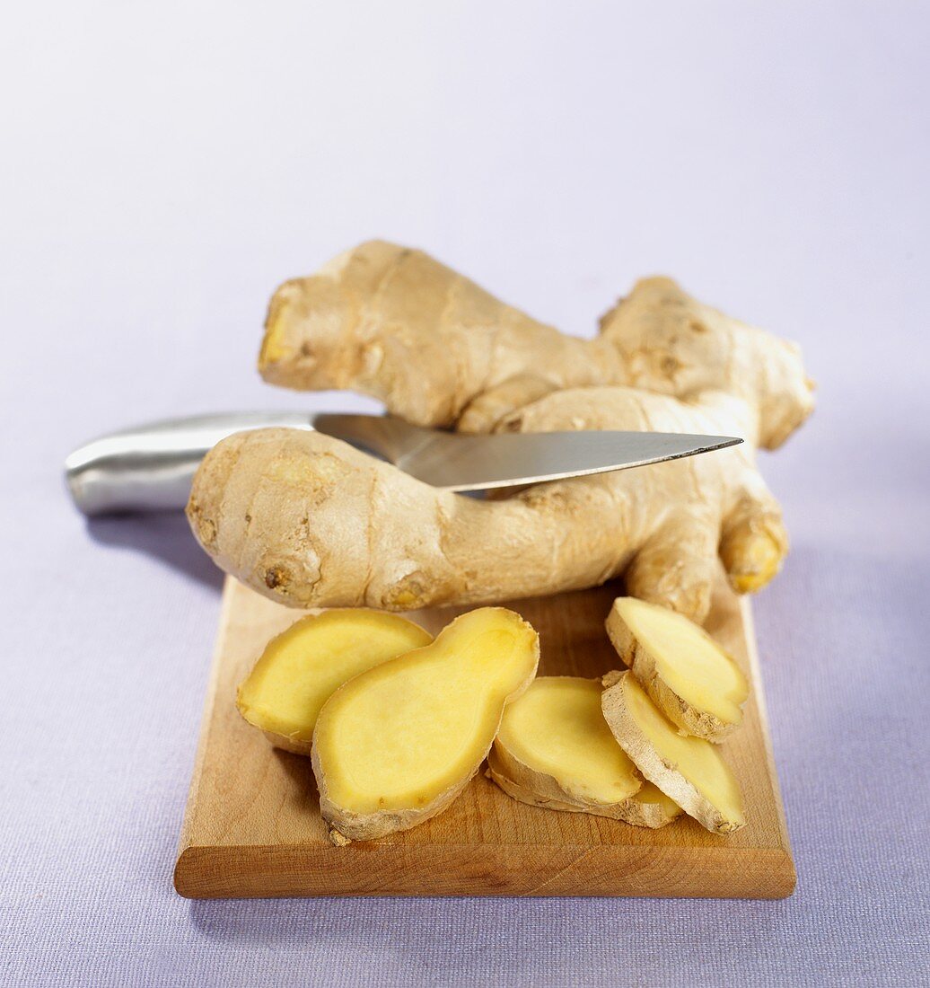Fresh ginger root, partly sliced