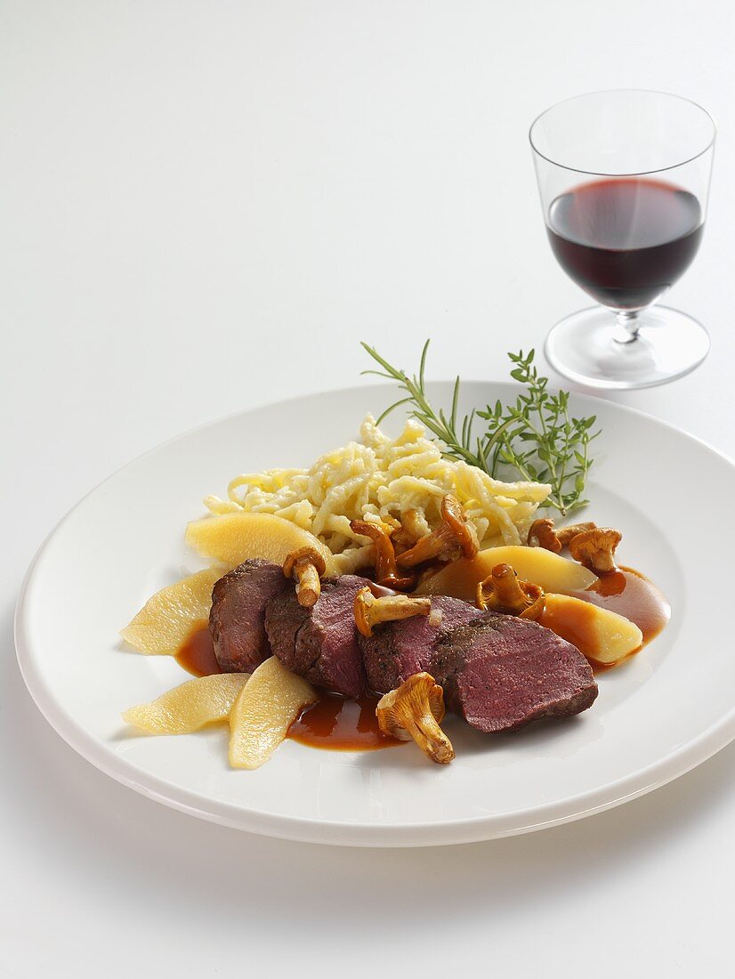 Venison with wedges of quince and spaetzle noodles