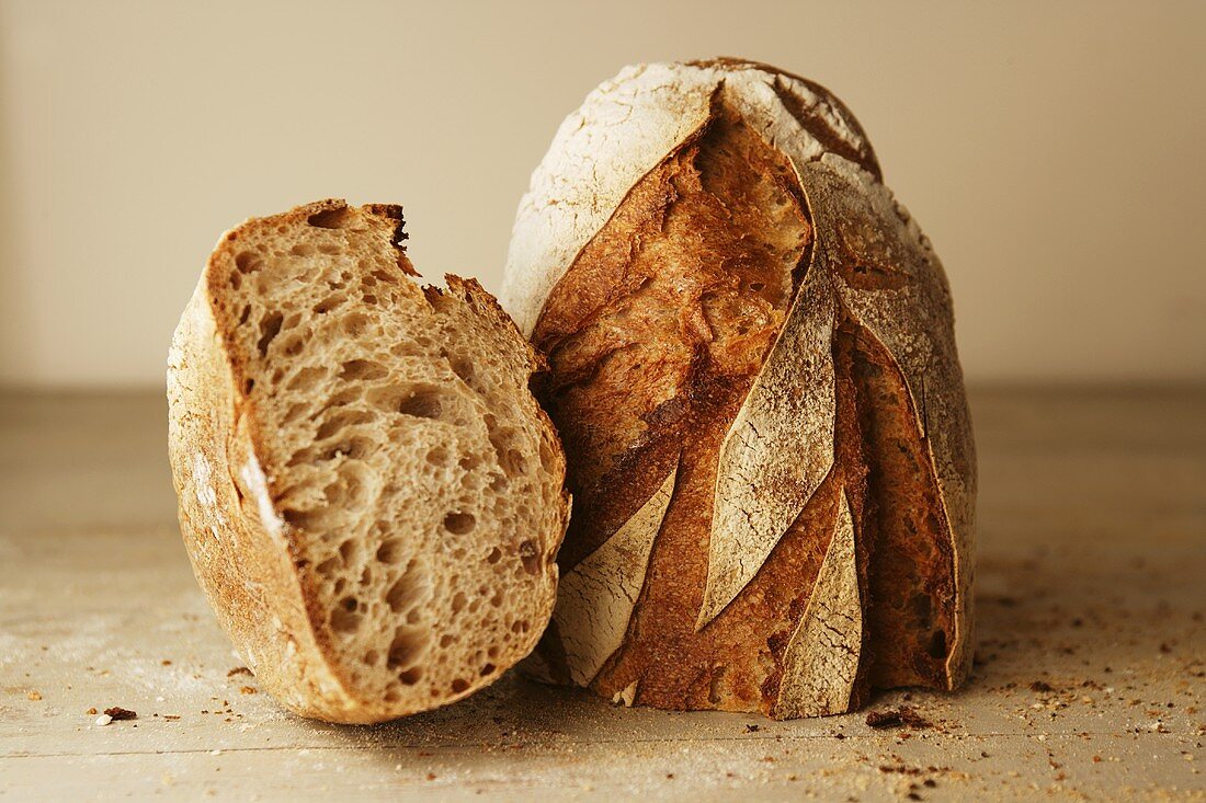 Farm bread, partly sliced