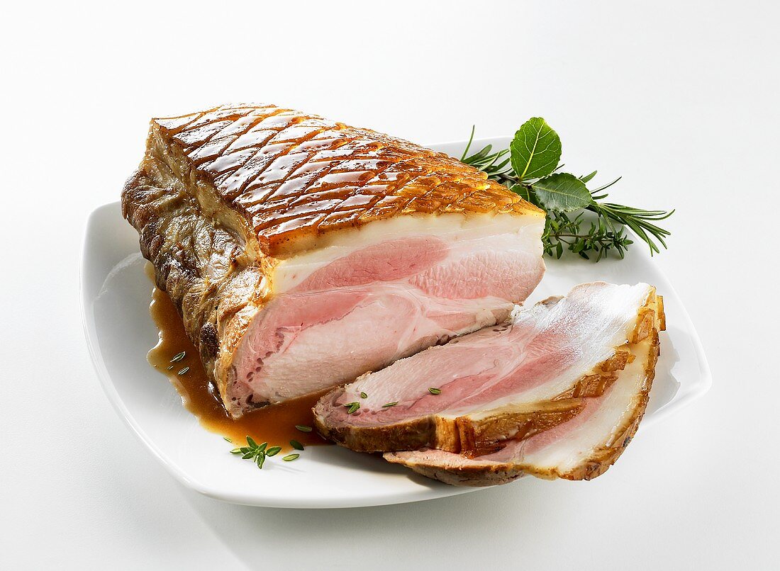Roast pork with crackling on a plate