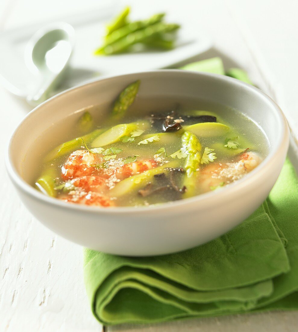 Exotic soup with green asparagus