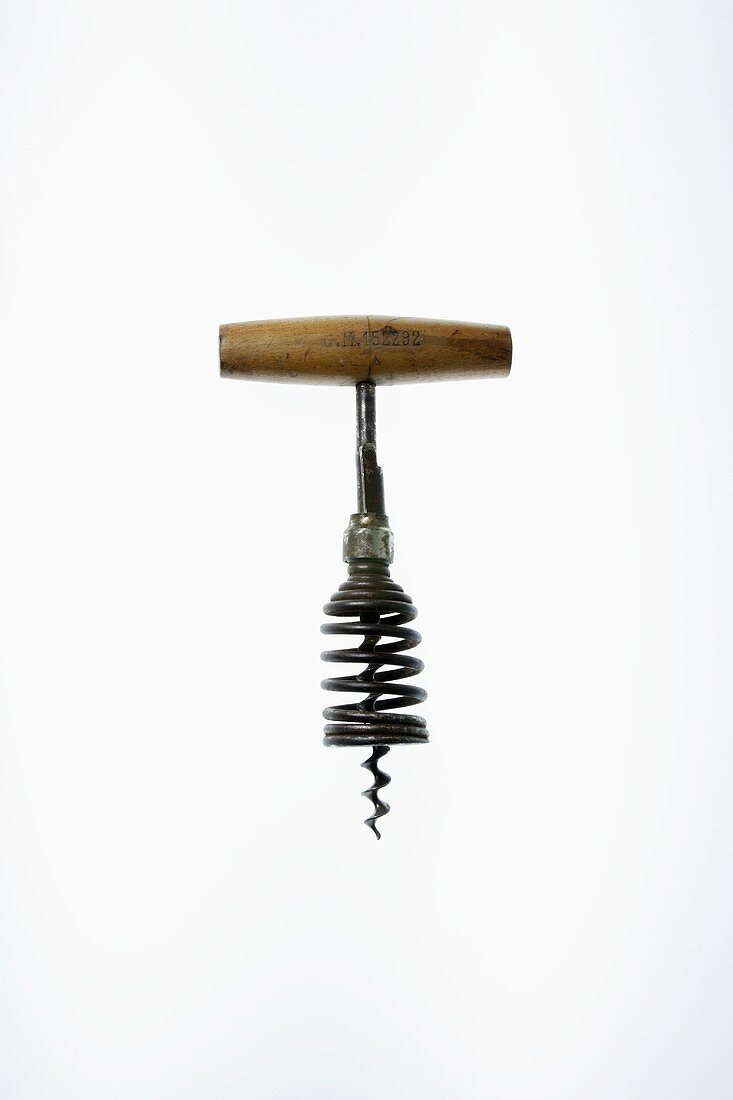 Antique corkscrew with wooden handle