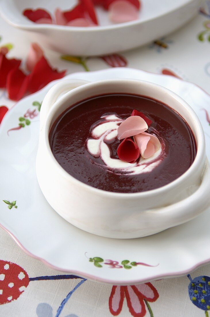 Cold cherry soup with rose petals