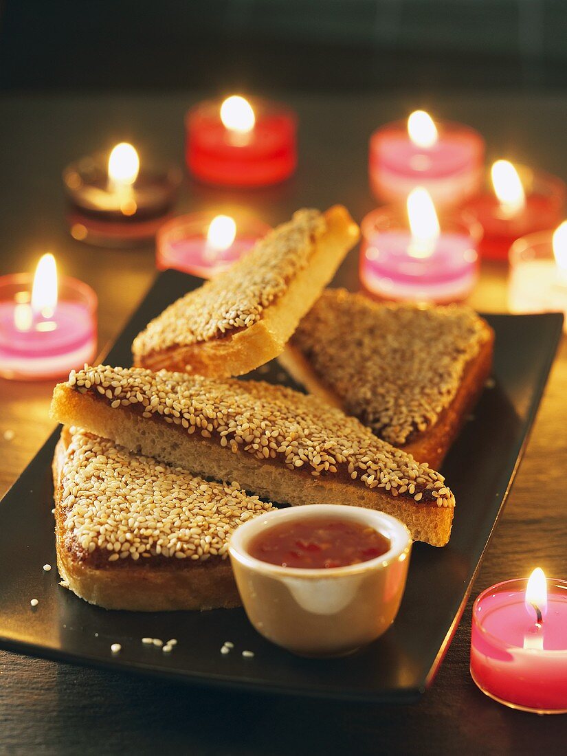 Toast triangles with shrimp paste and sesame (Thailand)
