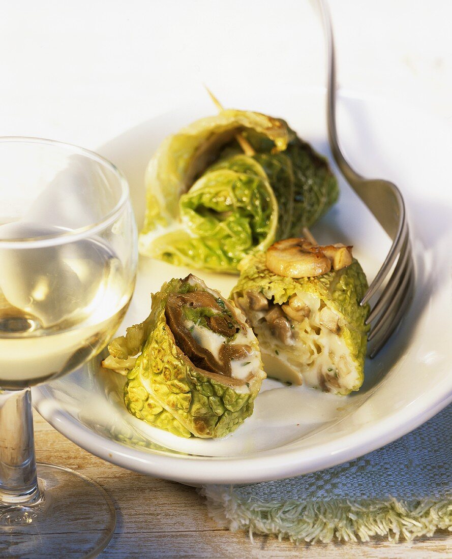 Savoy cabbage roulades with mushroom filling