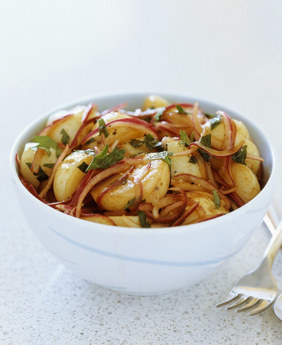 Potato salad with red onions and parsley