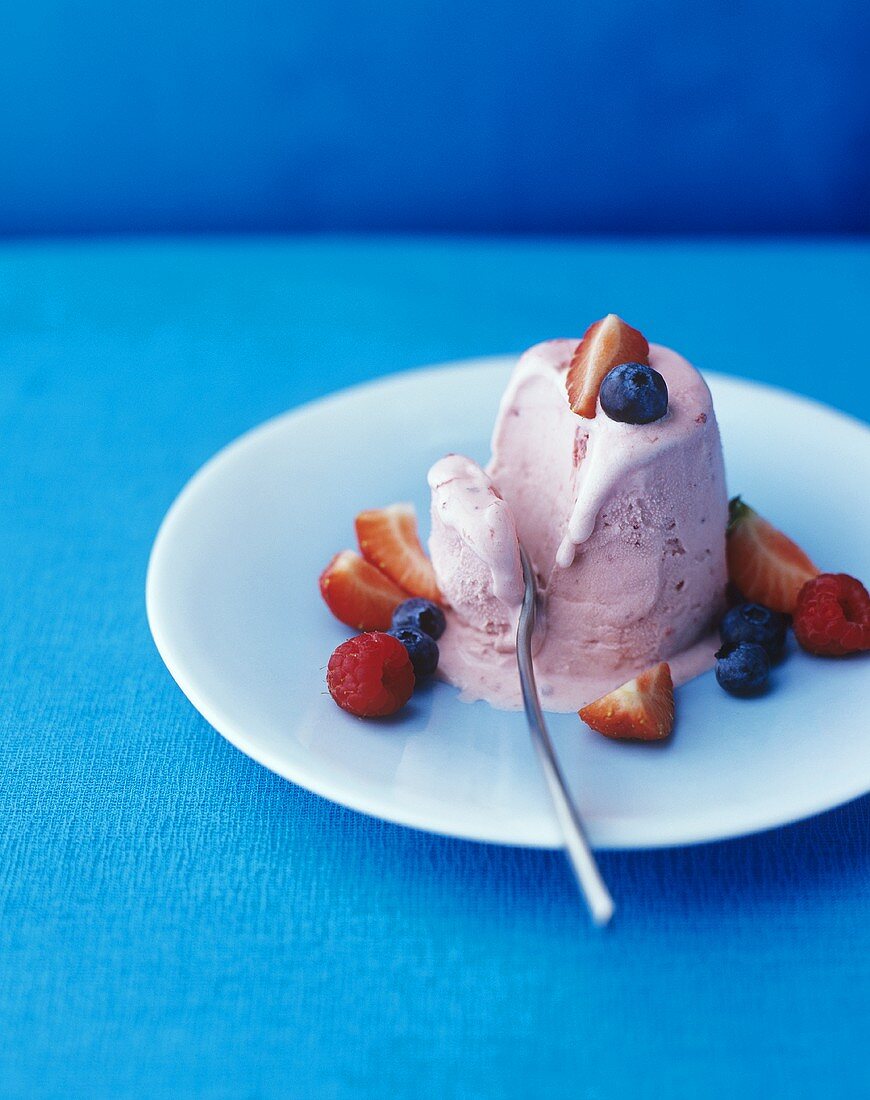 Strawberry ice cream with fresh berries